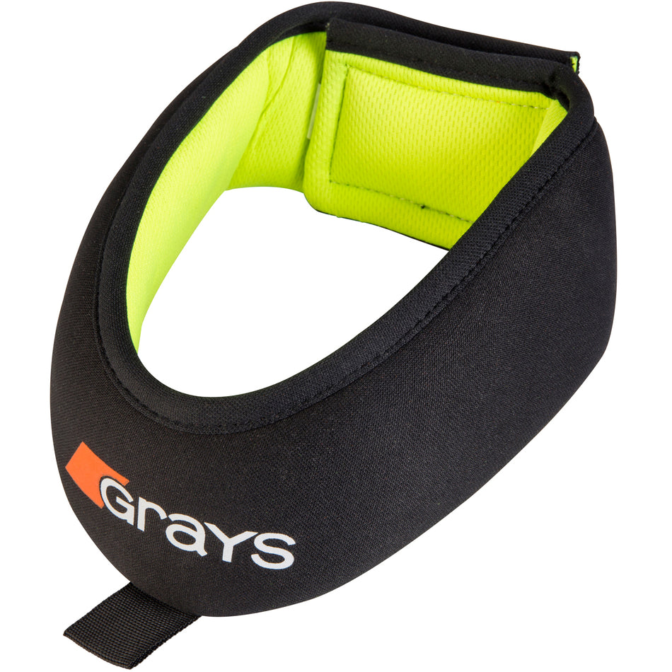 The Grays Nitro Neck Guard features black and neon yellow foam padding, a soft inner lining, full neck coverage for protection, and an adjustable strap. "Grays" is printed on the front in white and orange lettering.