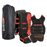 The Grays G90 Junior Goalie Set in black/red includes leg guards, chest protector, groin guard, arm pad, and storage bag—ideal for young goalies and shown against a plain background.