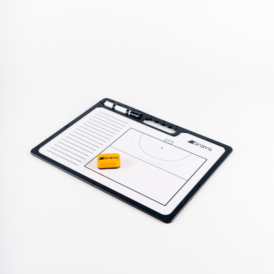 The Grays Hockey Tactic Board by Grays is a small white coaching board with a reusable surface, hockey field diagram, lined notes section, black dry-erase marker, and yellow eraser, all set on a white background.