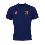 The Hawkesbury Upton CC Matrix V2 T-Shirt by Gray Nicolls is navy blue with a yellow embroidered club logo on the left chest, a white and red rectangular logo on the right, ribbed collar, and advanced moisture management for comfortable training.