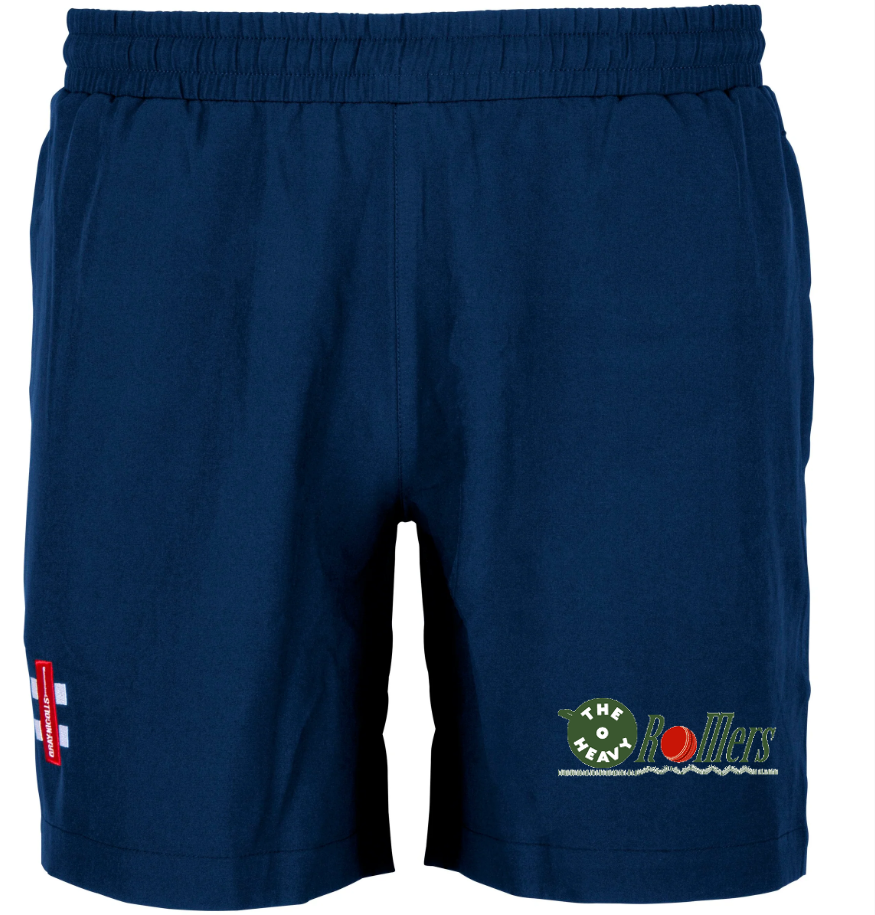 The Gray Nicolls Heavy Rollers CC Velocity Training Shorts are navy blue with an elastic waistband, a small red and white patch on the left leg, and a colorful The Lawn Rollers logo on the right. Ideal for peak training performance.
