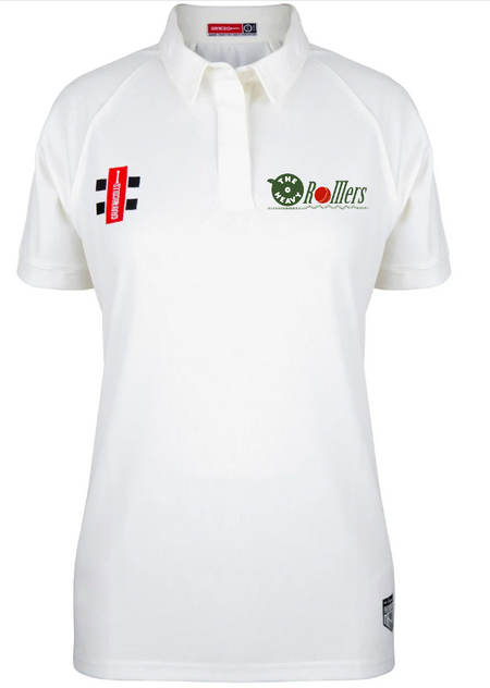 The Gray Nicolls Heavy Rollers CC Matrix V2 Women's S/S Match Shirt is a white, quick-drying sports shirt with short sleeves and a collar, featuring a green Rollers logo on the left chest, red sponsor patch on the right, and a hem tag.