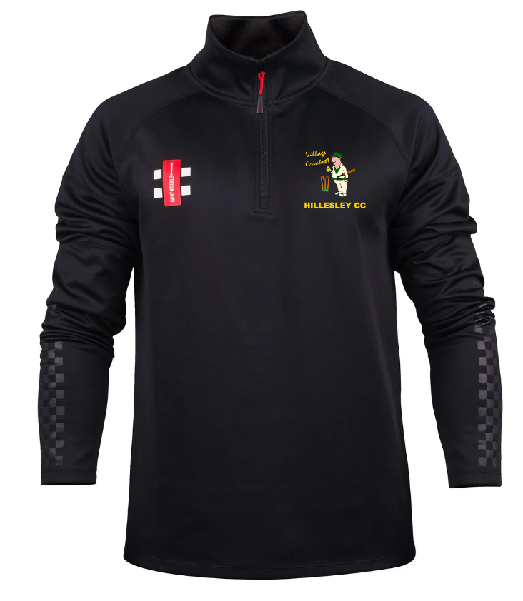 The Gray Nicolls Hillesley CC Pro Thermo Fleece is a black, long-sleeve wicking jacket with a red quarter-zip, checkered sleeve details, and two chest logos including the “Hillesley CC” badge featuring a cricket player.