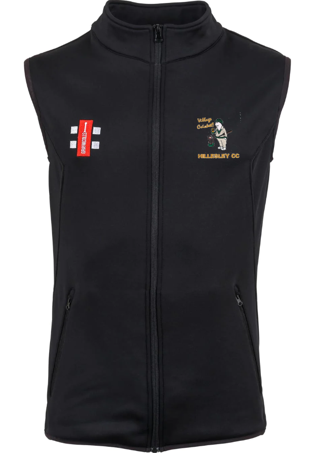 The Gray Nicolls Hillesley CC Black Storm Bodywarmer is a sleeveless micro-fleece vest with a front zipper, two zippered pockets, and small cricket-themed embroidered logos in red, white, and yellow on the left chest.