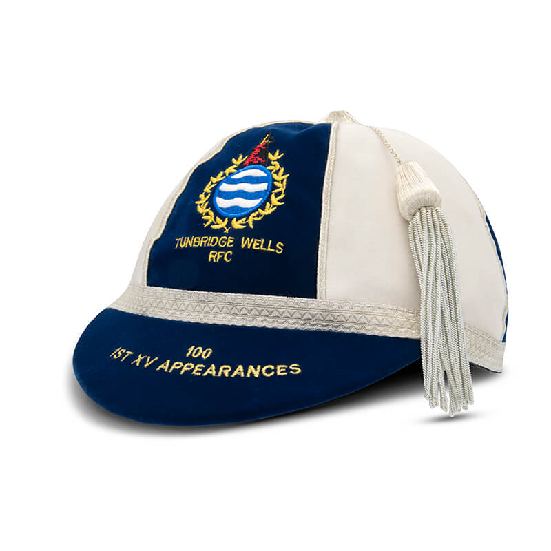 Celebrate achievements with a Custom Honour & Commemorative Cap by Martin Berrill Sports, featuring club crest embroidery and gold “100 1ST XV APPEARANCES”—ideal for those who appreciate the style of traditional cricket caps.