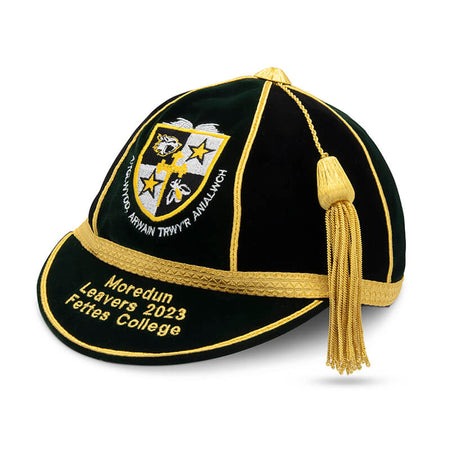 The Martin Berrill Sports Custom, Honour & Commemorative Cap features black and gold design, a gold tassel, crest embroidery, and "Moredun Leavers 2023 Fettes College"—ideal for honour caps or unique cricket souvenirs.
