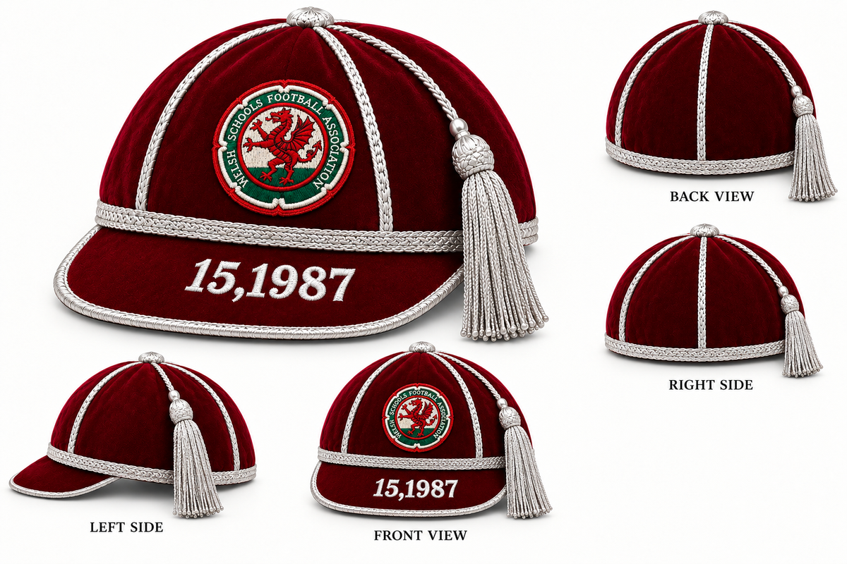 Maroon Custom, Honour & Commemorative Cap with silver piping, a silver tassel, and an embroidered Welsh Schools Football Association crest featuring a red dragon, with 15,1987 stitched on the brim.
