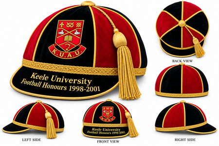A red and black paneled Martin Berrill Sports Honour & Commemorative Cap with a gold tassel, a shield emblem, and text reading Keele University Football Honours 1998-2001 embroidered on the brim.
