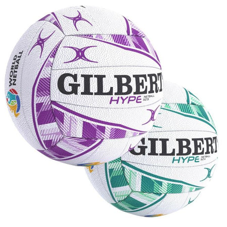 Two Gilbert Hype Match Netballs by Gilbert—one in purple and white, one in green and white—both featuring geometric patterns and the World Netball logo. Perfect as official match balls.