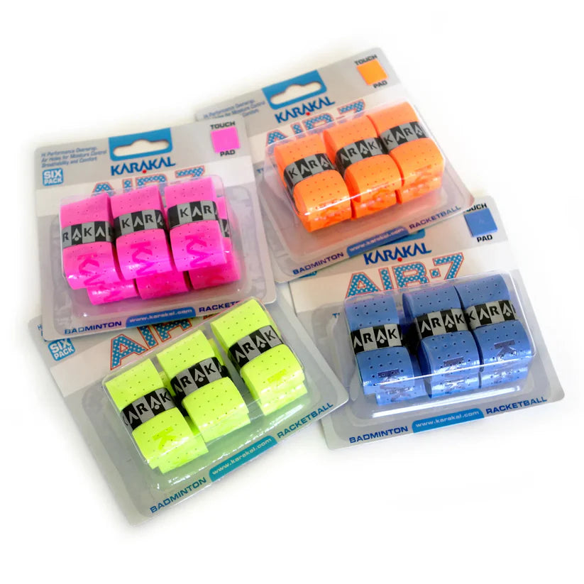 A six-pack of Karakal Air-7 Overwrap Racket Grips in neon pink, orange, yellow, and blue by Karakal, each offering excellent moisture control and sealed in clear plastic packaging on a white surface.