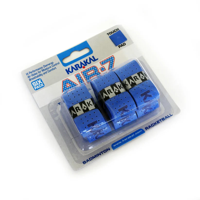 A 6-pack of Karakal Air-7 Overwrap Racket Grips in blue, designed for badminton and racquetball, provides excellent moisture control. Packaged with TOUCH and PAD labels visible on clear plastic and cardboard backing.