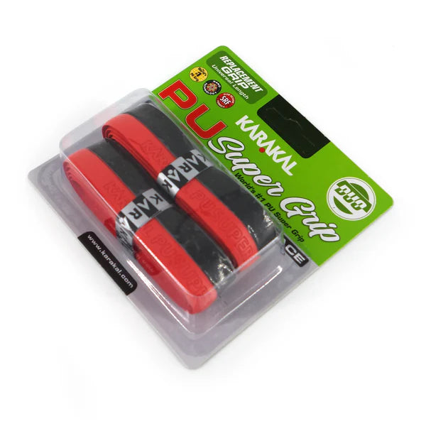 The Karakal PU Super Grip Duo - Pack of Two includes one black and one red replacement grip, ideal for racket sports, packaged in a branded plastic blister pack with green and white labeling.