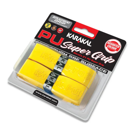 A pack of two Karakal PU Super Grip replacement racket grips in yellow, displayed in clear packaging with black, red, and white labeling.
