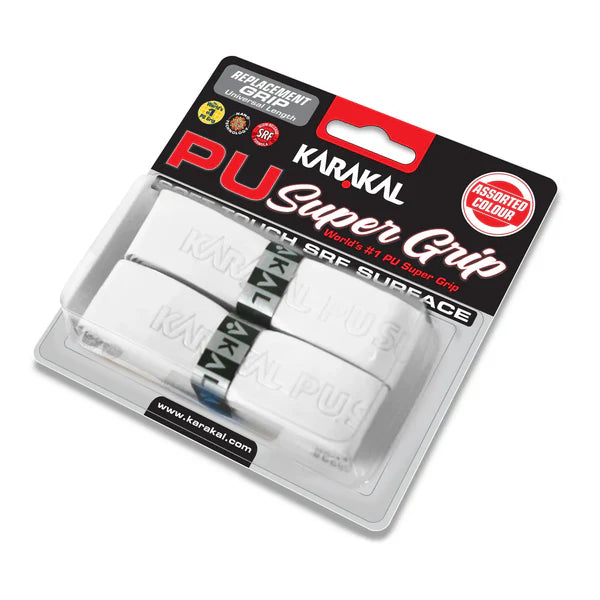 The Karakal PU Super Grip - Pack of Two (Plain Colours) includes two extra thick white racket grips with branding, packaged in a clear case with black and red labeling from Karakal.