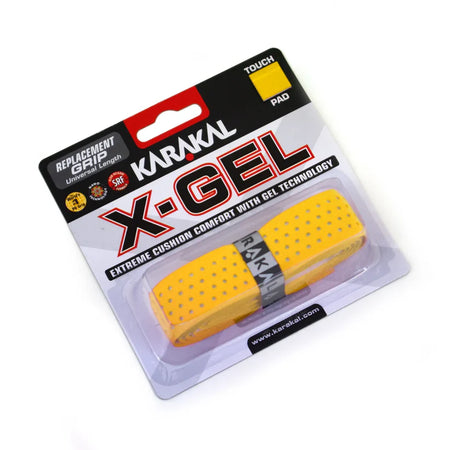 The Karakal X-GEL Grip, in yellow, offers gel padding and extreme cushion comfort for racket sports. The packaging highlights these features with perforations and black text.