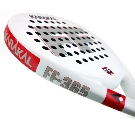Close-up of the teardrop-shaped head of the Karakal Padel FF 365, showcasing red and black accents, perforated holes, and bold Karakal branding on the frame and face.