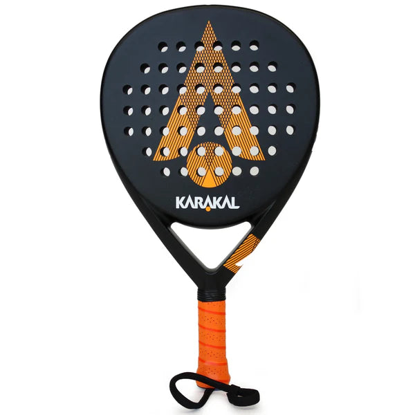 The Karakal Air Lite 345 Padel - Orange by Karakal is a lightweight graphite racket in black with orange accents, a large A design and circular holes on the face, featuring an orange grip and black wrist strap.