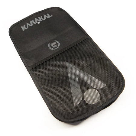 The Karakal Pure Touch Blue Pickleball Paddle features a textured surface for grip, and comes with a black cover featuring a grey logo and mesh pocket, offering stylish protection for your racket.