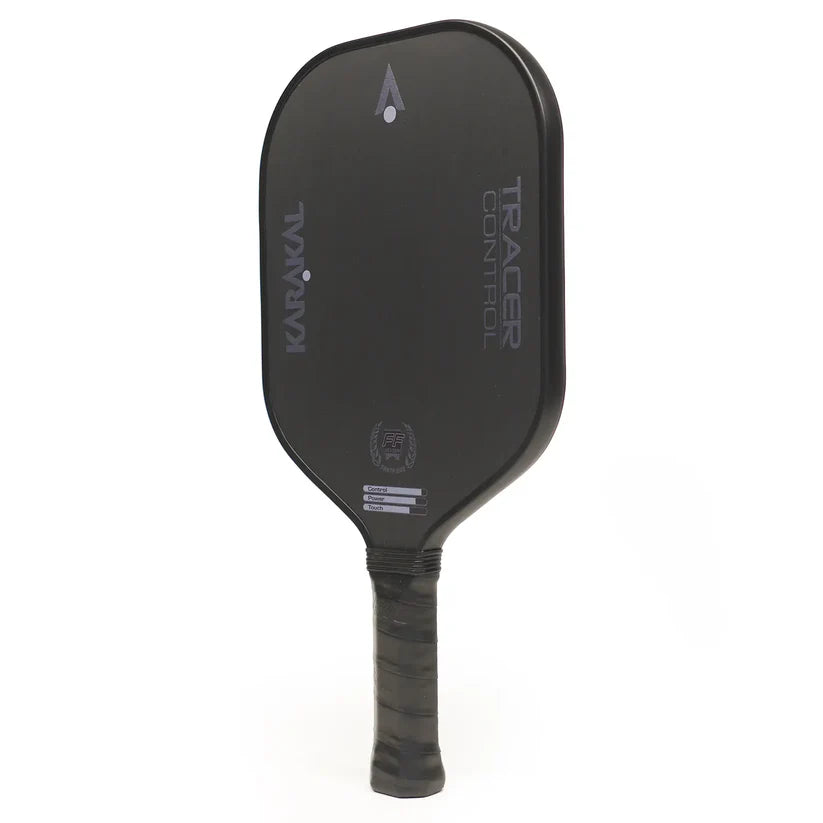 A black Karakal Tracer Control Pickleball Paddle with the brand name and model printed on the face, featuring a wrapped handle, sleek modern design, and a honeycomb power core for enhanced spin control.