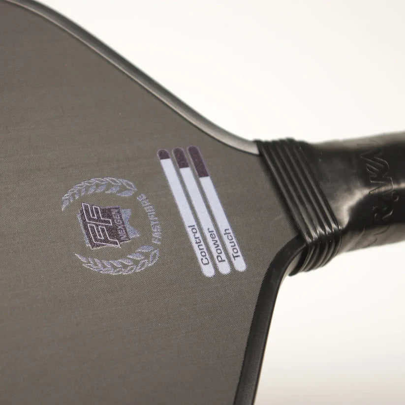 Close-up of the Karakal Tracer Control Pickleball Paddle face showing the Karakal logo, laurel design, and labeled control, power, and touch bars. Features a honeycomb power core for enhanced play, with black handle and edge.