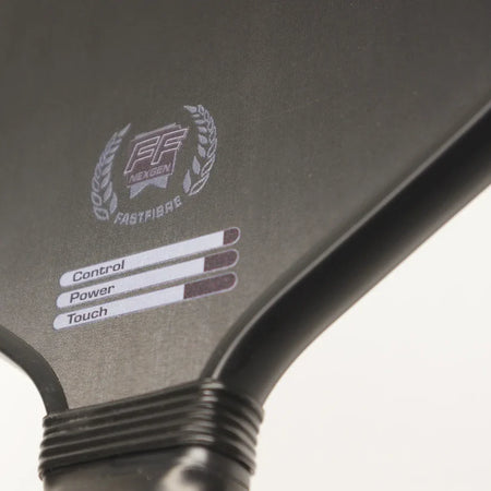Close-up of the black Karakal Tracer Control Pickleball Paddle with three rating bars—Control and Power rated higher than Touch—emphasizing spin control and a honeycomb power core for powerful, precise play. Brand: Karakal.