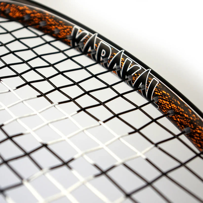 Close-up of the Karakal Air Touch 2.1 Squash Racket by Karakal, in black and orange, made from high modulus graphite with a detailed string pattern for a lightweight, premium squash racket feel.