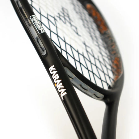 Close-up of the Karakal Air Touch 2.1 Squash Racket, made from high modulus graphite, featuring the Karakal logo on the shaft and tightly strung strings set against a white background.
