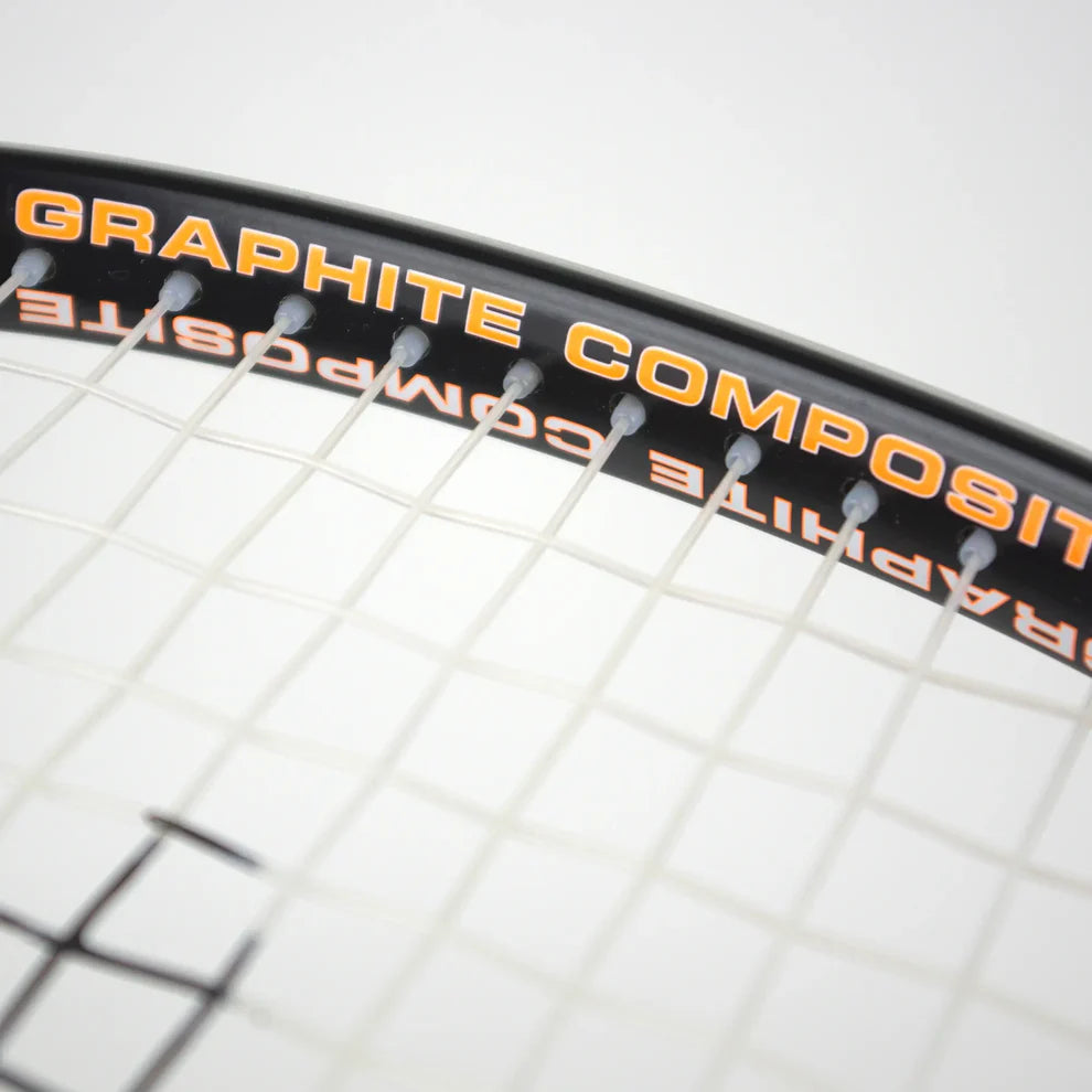 Close-up of the Karakal CRX-Hybrid 2.1 Racketball Racket by Karakal, featuring a lightweight graphite composite frame, detailed strings, and "GRAPHITE COMPOSITE" text in yellow along the black edge.