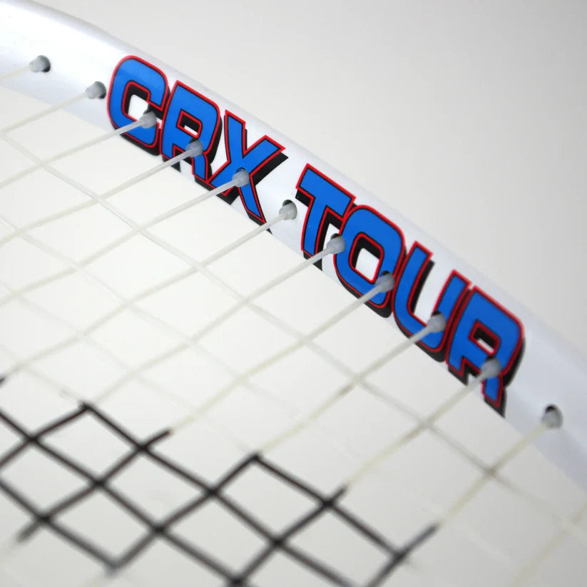 Close-up of the Karakal CRX-Tour 2.1 Racketball Racket by Karakal, featuring “CRX TOUR” in blue and red on the frame, 7050 alloy construction, visible strings, and part of the midplus head against a plain background.