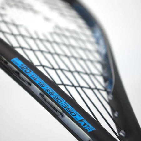 Close-up of the Karakal Air Speed 2.1 Squash Racket by Karakal, made from high modulus graphite, highlighting its lightweight design, detailed strings, and blue specs on the frame against a blurred light grey background.