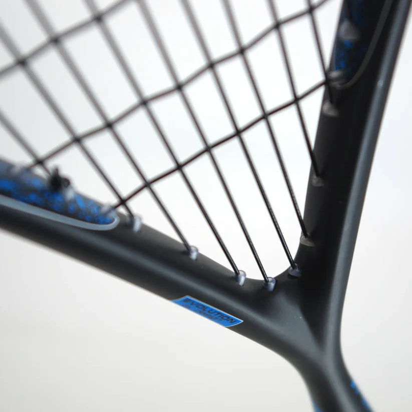 Close-up of the Karakal Air Speed 2.1 Squash Racket, featuring a black and blue high modulus graphite frame with a blue Precision label; the lightweight Karakal racket is pictured against a blurred background.