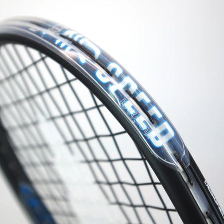 Close-up of the Karakal Air Speed 2.1 Squash Racket by Karakal, featuring black high modulus graphite, blue and white "SPEED" lettering on the frame, visible strings, and part of the racket’s edge against a plain light background.