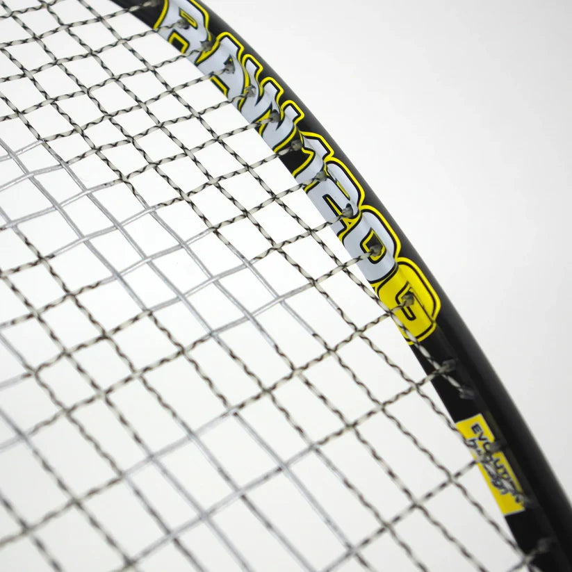 Close-up of the Karakal Raw 120 2.1 Squash Racket by Karakal, an ultra-light graphite racket, showing details of the strings and frame with “RAW 120G” marking visible.