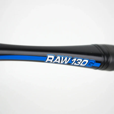 Close-up of the Karakal Raw 130 2.1 Squash Racket’s black handle with blue accents and white RAW 130G text, highlighting its graphite frame by Karakal against a plain white background.