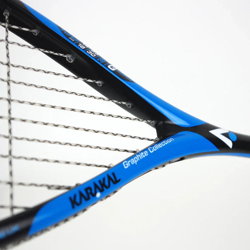 Close-up of the Karakal Raw 130 2.1 Squash Racket, featuring a blue and black graphite frame, detailed strings, and prominent Karakal branding.