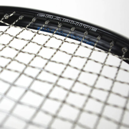 Close-up of the strings and black graphite frame of the Karakal Raw 130 2.1 Squash Racket, with "GRAPHITE" printed on the frame.