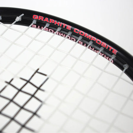 Close-up of a tennis racket head, featuring white strings and the words GRAPHITE COMPOSITE in red on a black frame, resembling the lightweight Karakal Pro Hybrid 2.1 Squash Racket by Karakal.