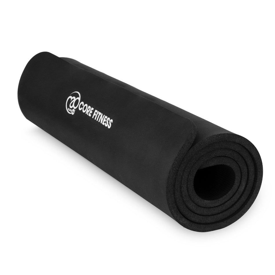 The Fitness Mad Core Fitness Mat 10mm is a black exercise mat featuring the Fitness Mad logo in white on the surface, made from cushioned NBR foam to provide extra comfort—ideal for Pilates or any fitness routine.