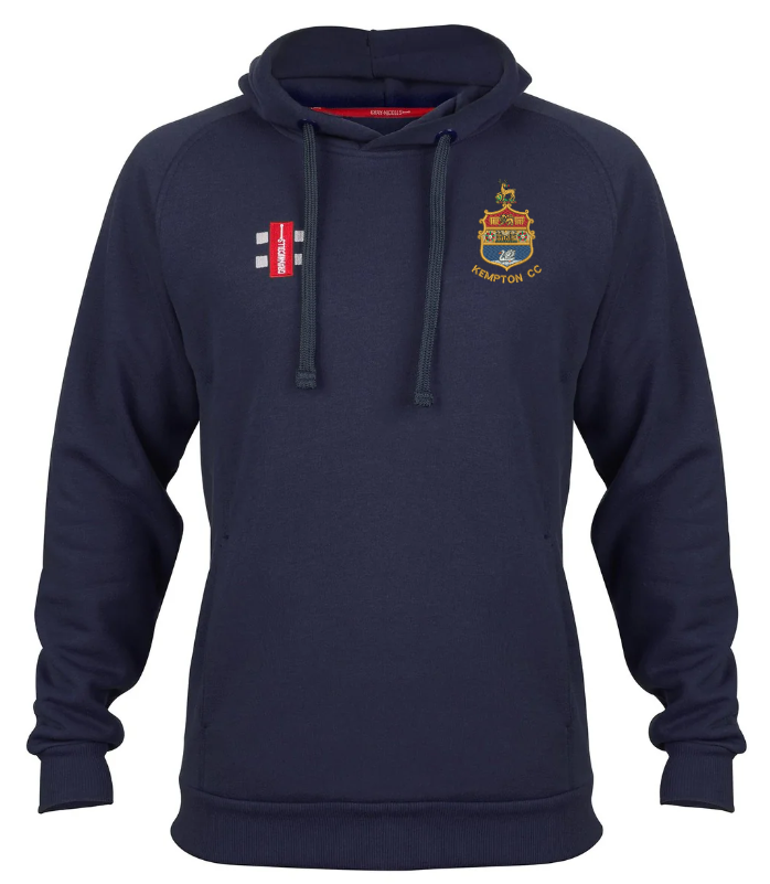 The Kempton CC Velocity Hoodie by Gray Nicolls is crafted from sustainable cotton in navy blue, featuring a drawstring hood, an embroidered crest on the left chest, a red and white logo on the right, long sleeves, and ribbed cuffs.