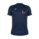 The Gilbert Kings School Photon II Tee Shirt in navy blue features moisture control, a small white logo on the right chest, and a crest with red text and a castle on the left, displayed against a plain white background.