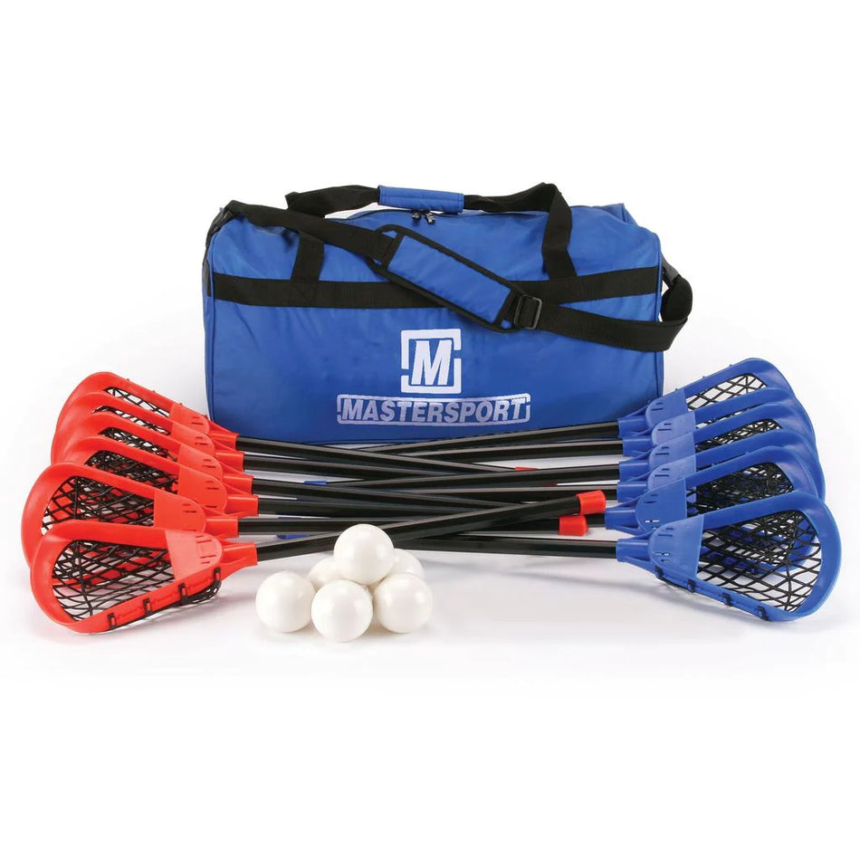 A blue Mastersport Pop Lacrosse Set (Shorter Shaft) duffel bag is shown behind six red and six blue beginner sticks in a fan shape, with six white balls in front—ideal for youth lacrosse practice.