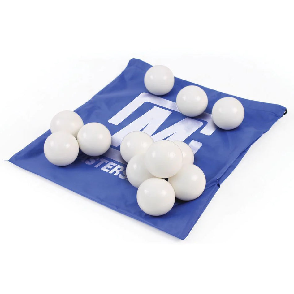 A blue drawstring bag with a white logo holds and displays twelve 7cm Mastersport Pop Lacrosse Balls, scattered on and around it.