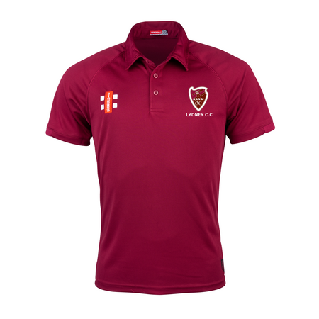 The Lydney CC Matrix V2 Maroon Polo by Gray Nicolls features short sleeves, a cricket logo and LYDNEY C.C. text on the chest, a white/red graphic on the right chest, and moisture-wicking fabric for comfort.