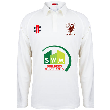 The Gray Nicolls Lydney CC Matrix V2 Long Sleeved Playing Shirt is a white cricket top with the Lydney C.C. chest logo, SWM Builders Merchants sponsor in green and red, and breathable sportswear branding details.