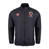 The Gray Nicolls Lydney CC Velocity Rain Jacket is a black, lightweight, water repellent cricket jacket with a stand-up collar, zip front, and two embroidered chest logos: the Lydney C.C. shield and red/black/white vertical emblem.