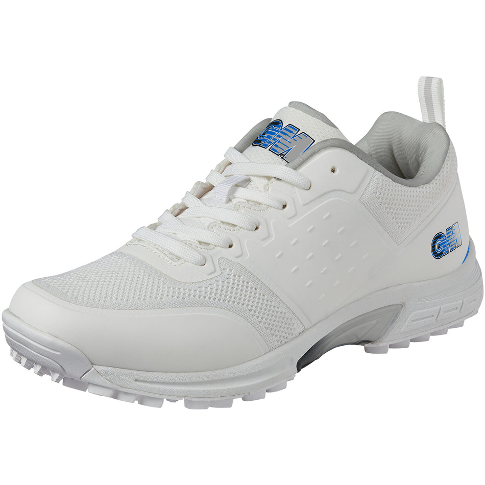 The Gunn & Moore Maxi Allrounder Cricket Shoe by Gunn & Moore features a breathable white mesh upper, textured sole, and blue accents on the heel and tongue—shown at an angle, it's perfect as a lightweight, versatile cricket shoe.