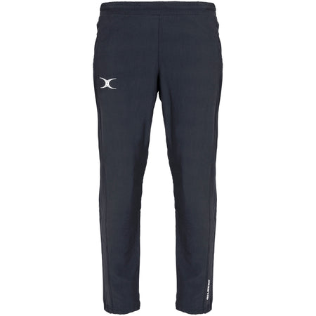 The Gilbert Synergie V3 Junior Trousers in black feature a white logo on the left thigh and small white text on the lower right leg, ideal for active days or as durable school uniform trousers. Shown against a white background.