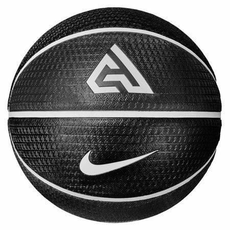 The Nike Playground 2.0 Giannis Basketball by Nike is a black, textured deep channel ball with a white Nike swoosh and geometric logo, designed for enhanced grip, shown against a white background.