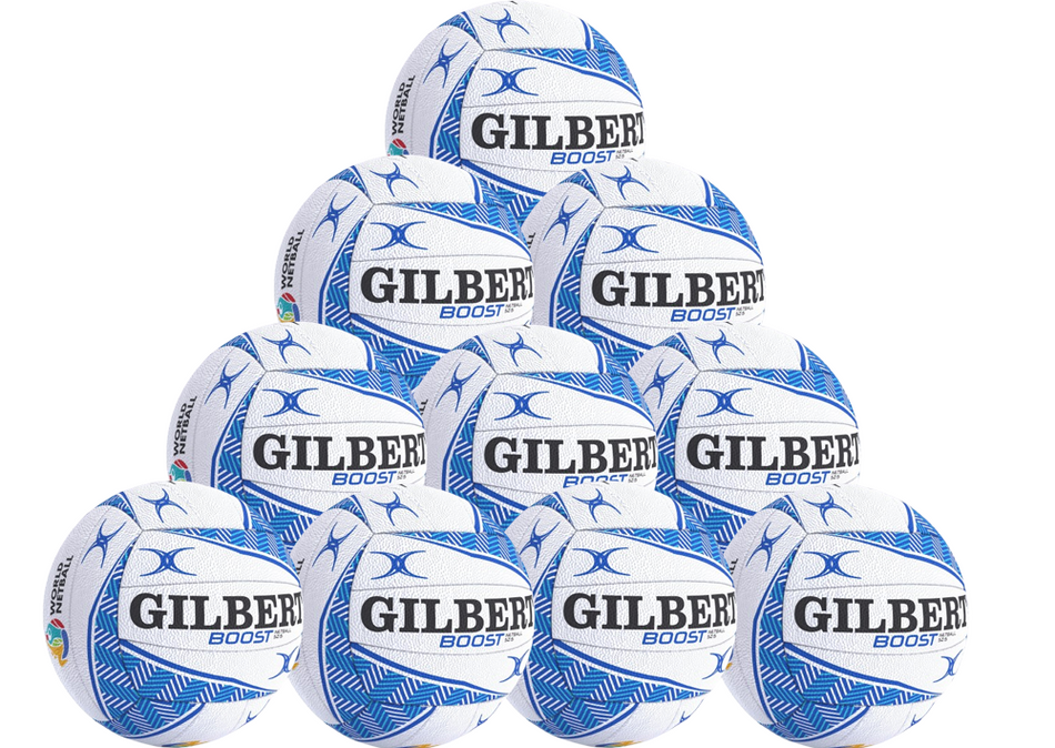 A pyramid-shaped stack of ten Gilbert Boost Match Netball balls, from the Gilbert Boost Match Netball Ten Pack, features the brand name GILBERT and BOOST, highlighting these top-quality match netballs.