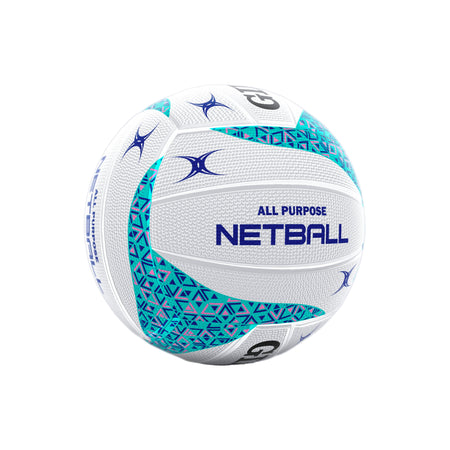 The Gilbert APT Netball by Gilbert is white and teal with blue geometric patterns, textured panels, small blue star logos, and "ALL PURPOSE NETBALL" printed on it—ideal for outdoor training.